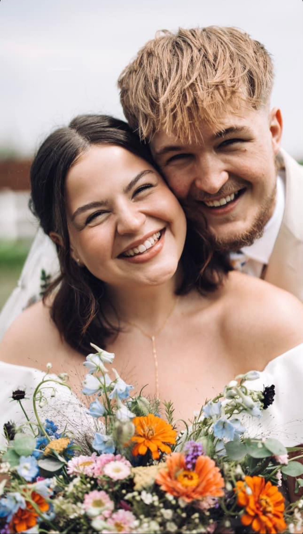 couple posing on wedding day